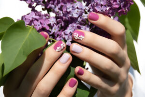 Nail paint, nail art, nail embellishments, nail beads, purple nails, beautiful nails, 